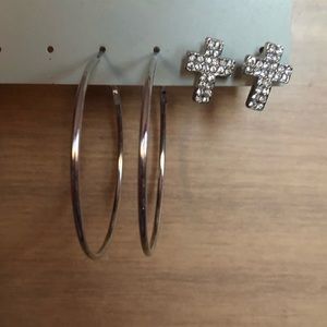 Silver hoops and silver cross earrings